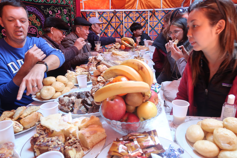 Feast inside a yurt